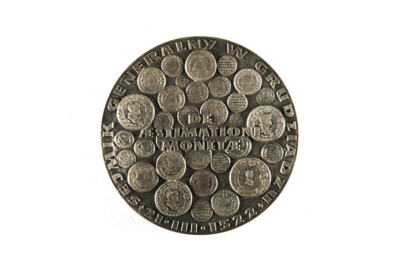 The reverse of Edward Gorol's medal from 1962 commemorating Copernicus' appearance at the General Assembly of Royal Prussia in Grudziądz on March 21, 1522. The surface of the medal shows the images of coins that were in circulation during Copernicus' time in his native Royal Prussia. The Regional Museum in Toruń